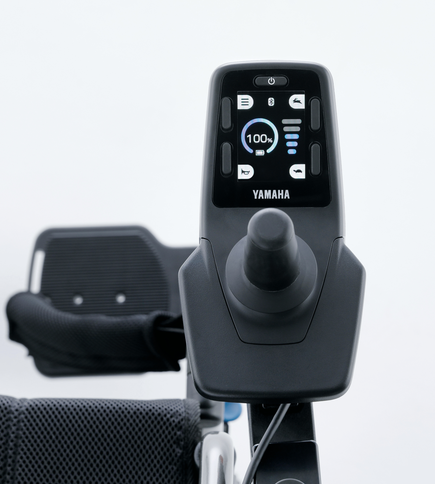 Joystick controller with LCD display showing battery and speed