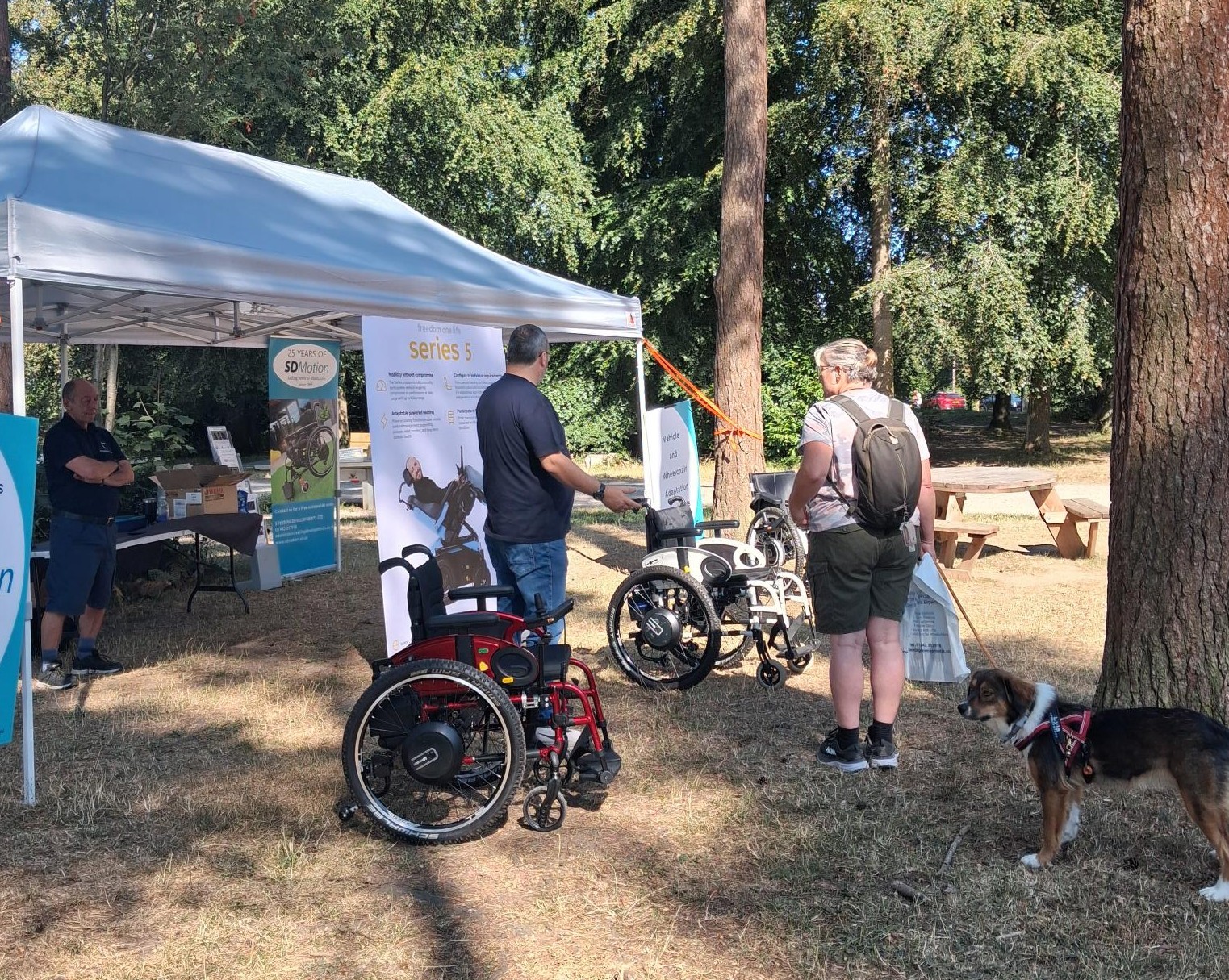 Staff showing various wheelchair options