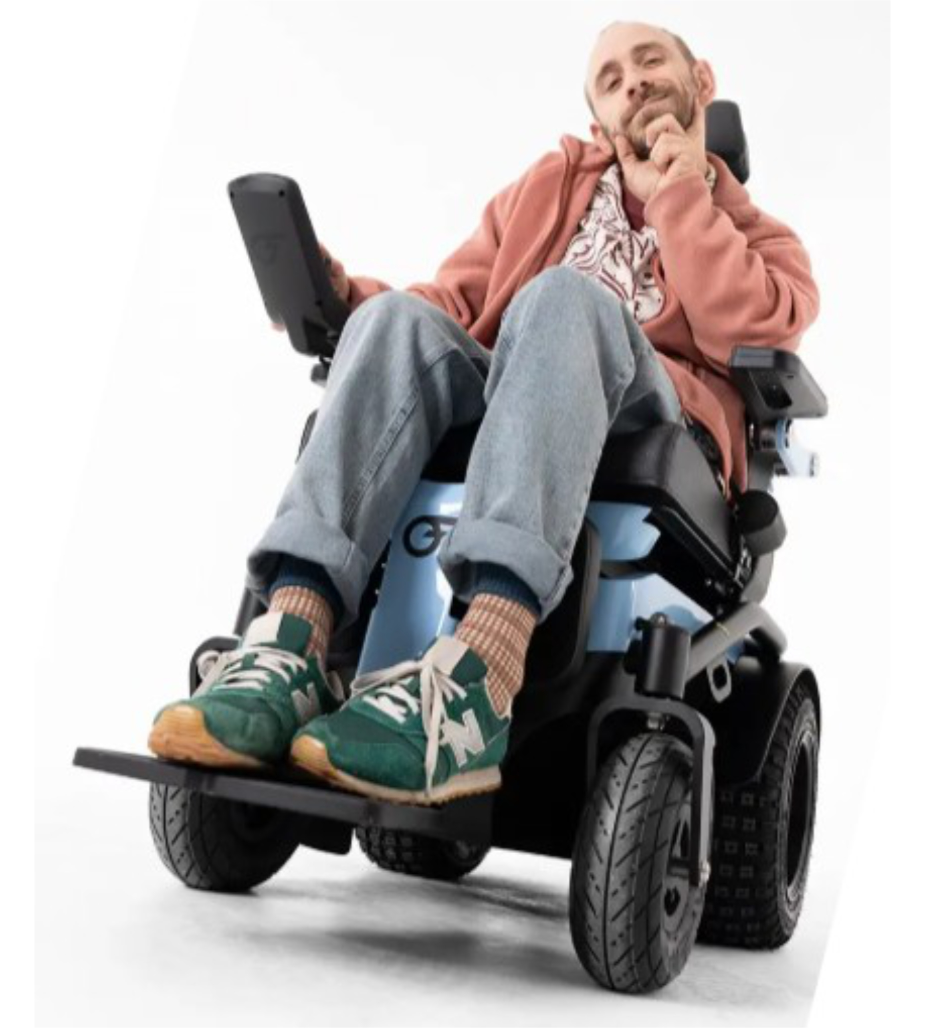 Man seated in a light blue Series 5 powerchair