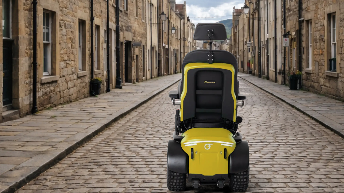 Freedom One Life Series 5 powerchair on a cobbled street